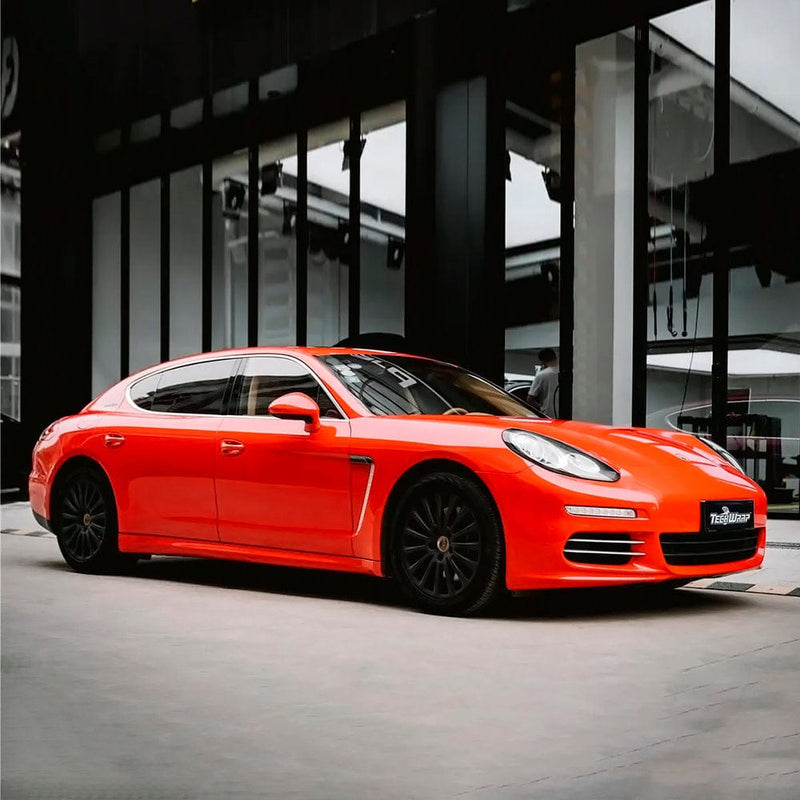 sedan wrapped in Lava Orange Gloss Vinyl