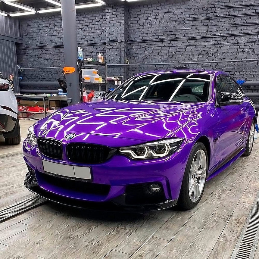 Car Wrapped By Purple Car