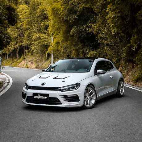 Volkswagen Scirocco sports car fully wrapped in TeckWrap Slate Grey (CG16-HD) High Gloss Vinyl, showcasing a vibrant gloss finish with clean body lines — ideal for dynamic and sporty vehicle styling.