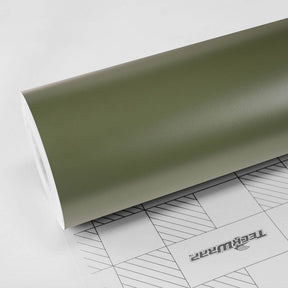 Military Green (CM09) Vinyl Wrap by TeckWrap – a high-quality car wrap featuring a super matte finish, shown partially unrolled with a printed grid backing for precise application, ideal for automotive customization.