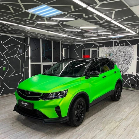 Side-angle view of a car wrapped in Paradise Green Satin Vinyl Wrap (SMT12), highlighting the vibrant color and flawless satin finish.