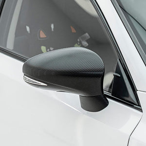 Side mirror wrapped in Pitch Black Carbon vinyl (CF02)